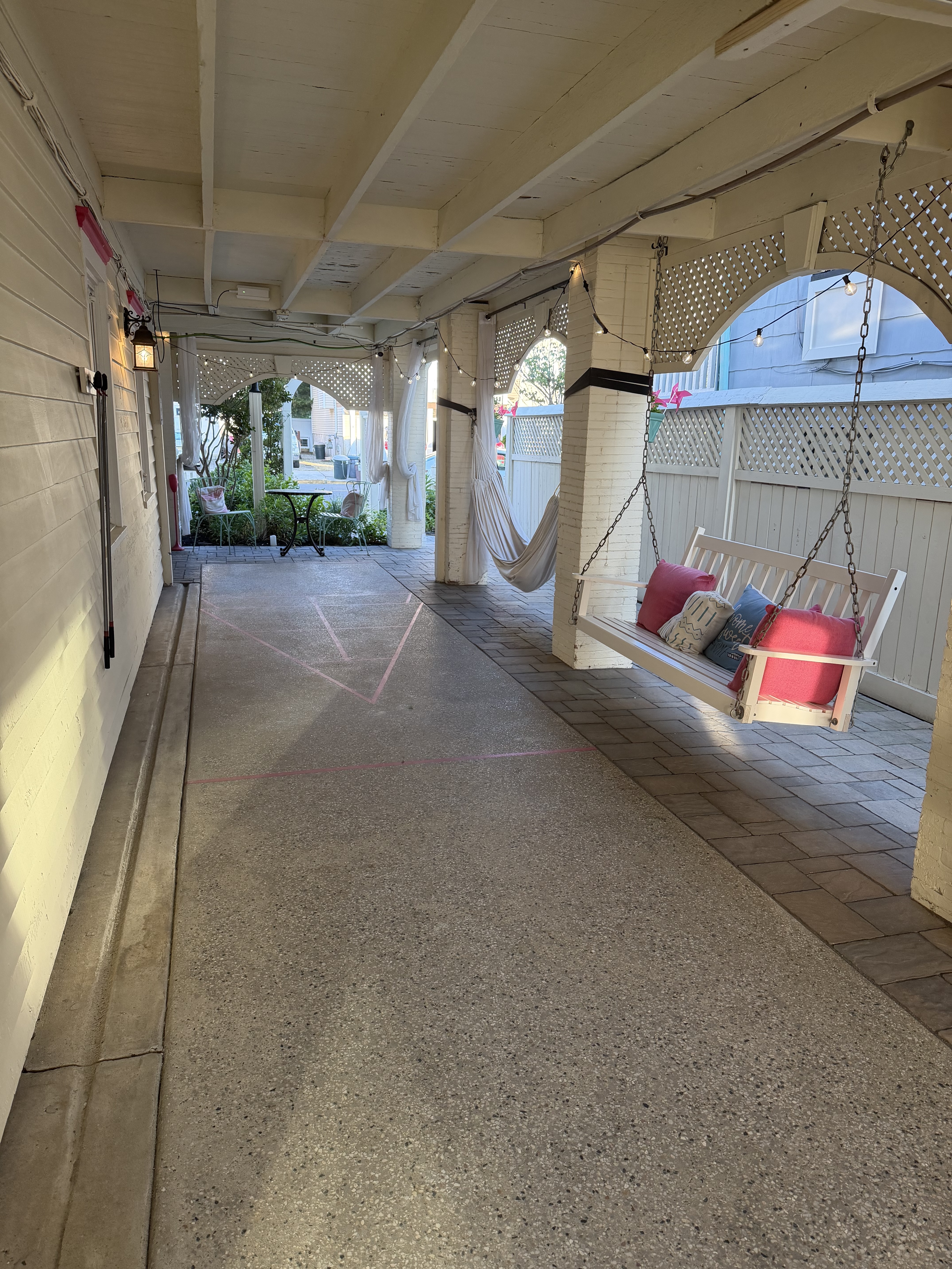 Scarborough Inn shuffleboard and porch area
